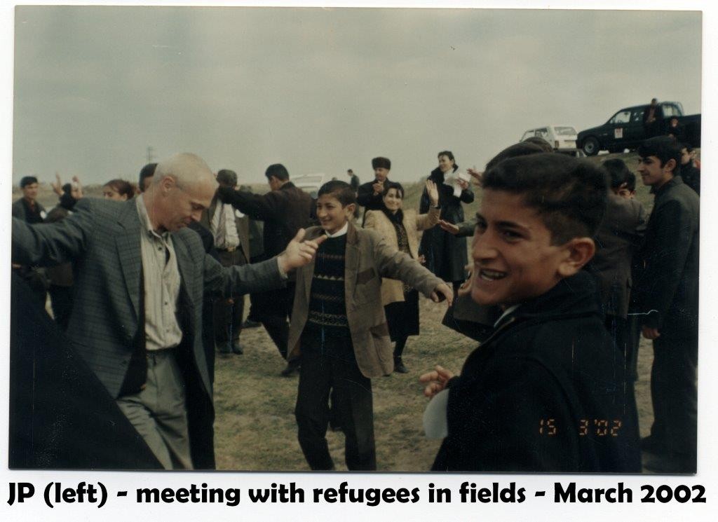 azerbaijan hockey MEETING FIELDS REFUGEES 2002